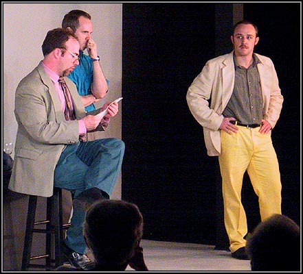 Yvan (Matthew Lawler) reads a pithy quote from his therapist as Marc (Craig Bentley) and Serge (Corey Patrick) listen in disbelief.