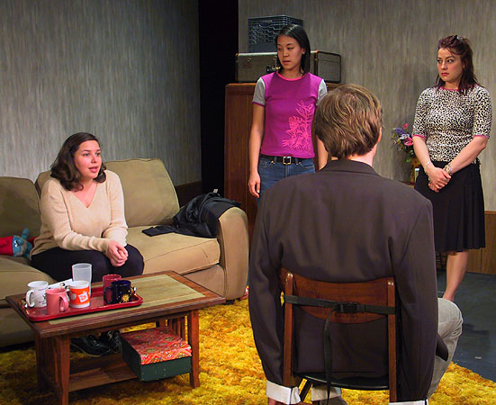 Vincenza (Meredith Lucio) asks Ritchie (John Goode) some pointed questions about his youth while Tonigirl (Elizabeth Wong) and Kimmarie (Trista Dellyn) look on.